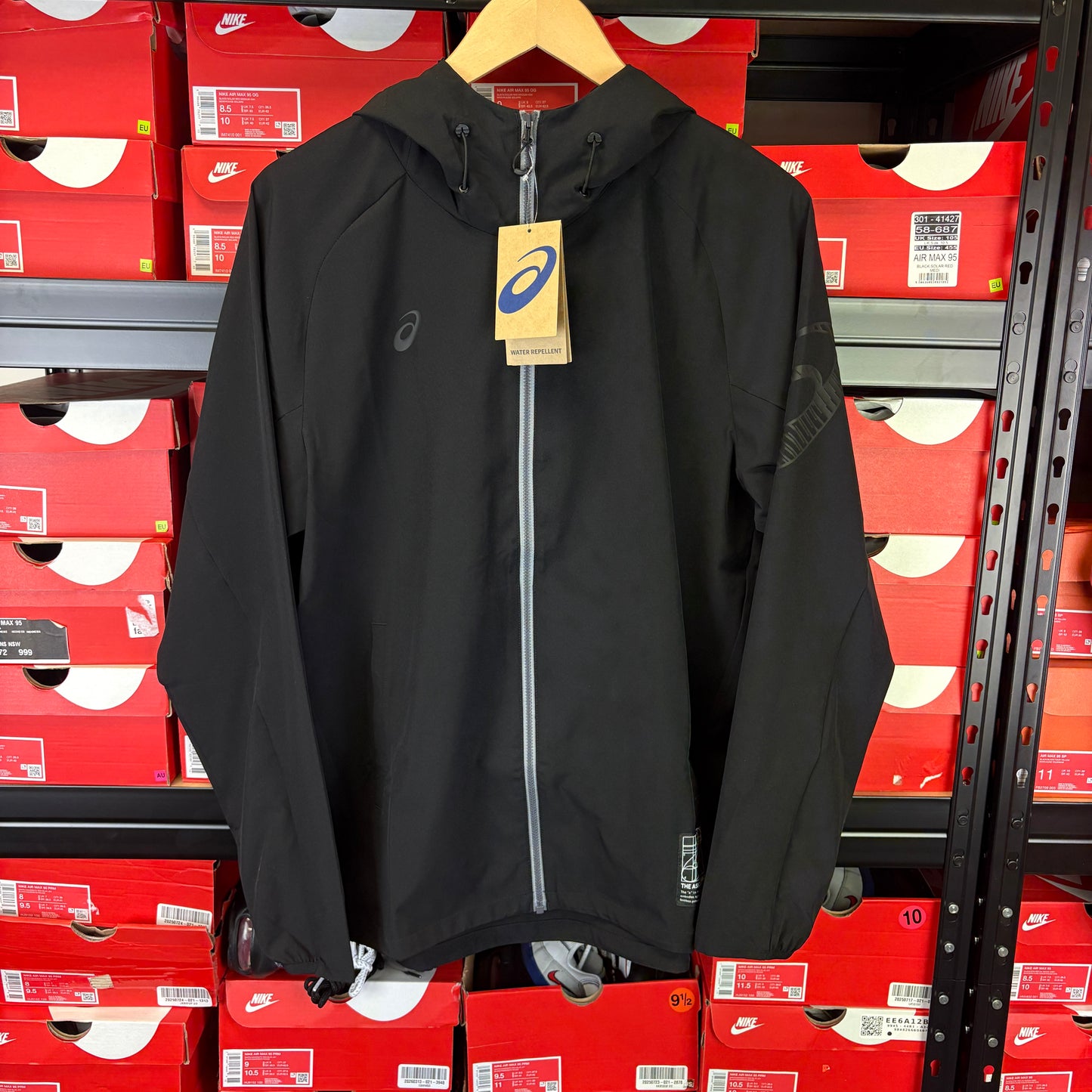 Asics Triple Black “Spiral” Jacket