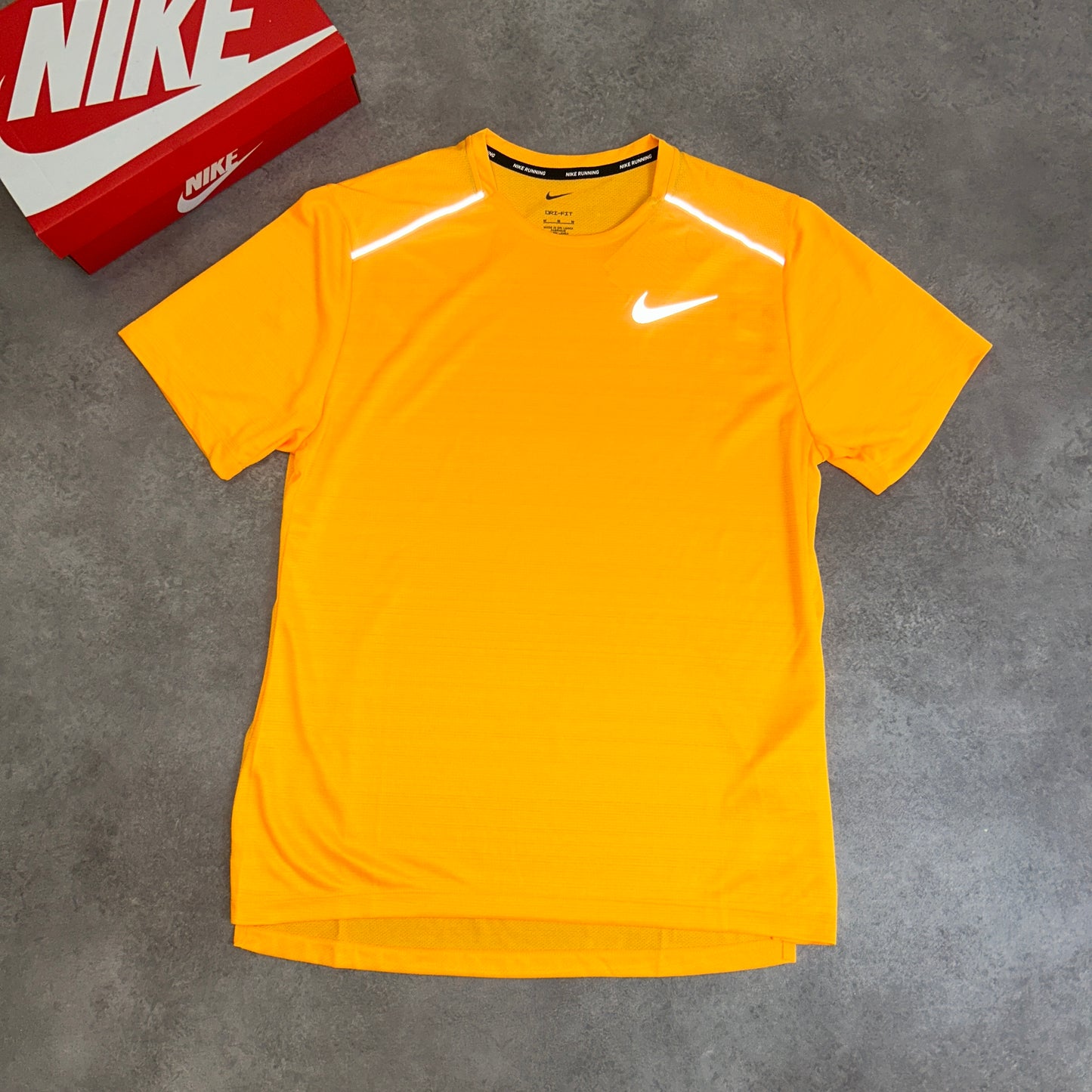Nike “Light Orange” Miler 1.0