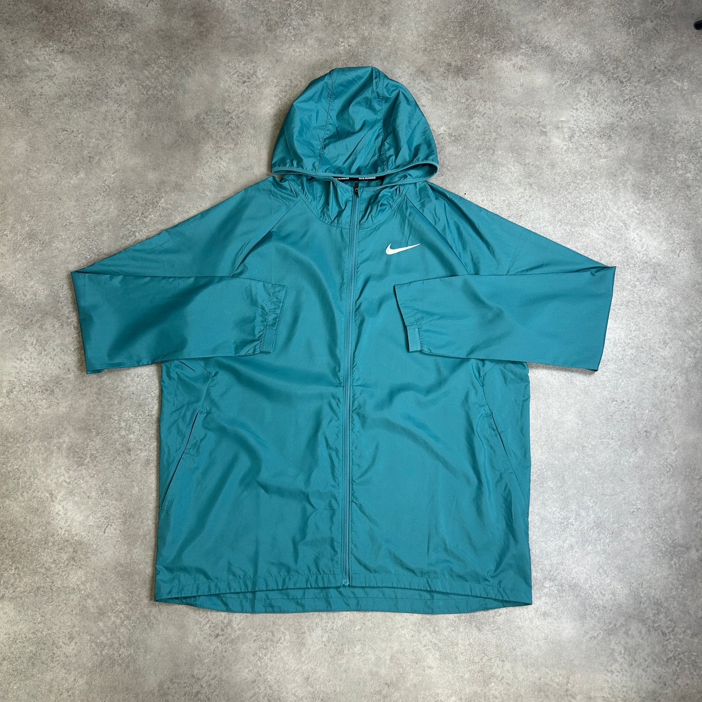 Nike “Essential” Teal Windrunner