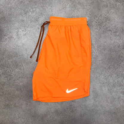 Nike “Sunset Orange” Flex Stride Shorts (“7)