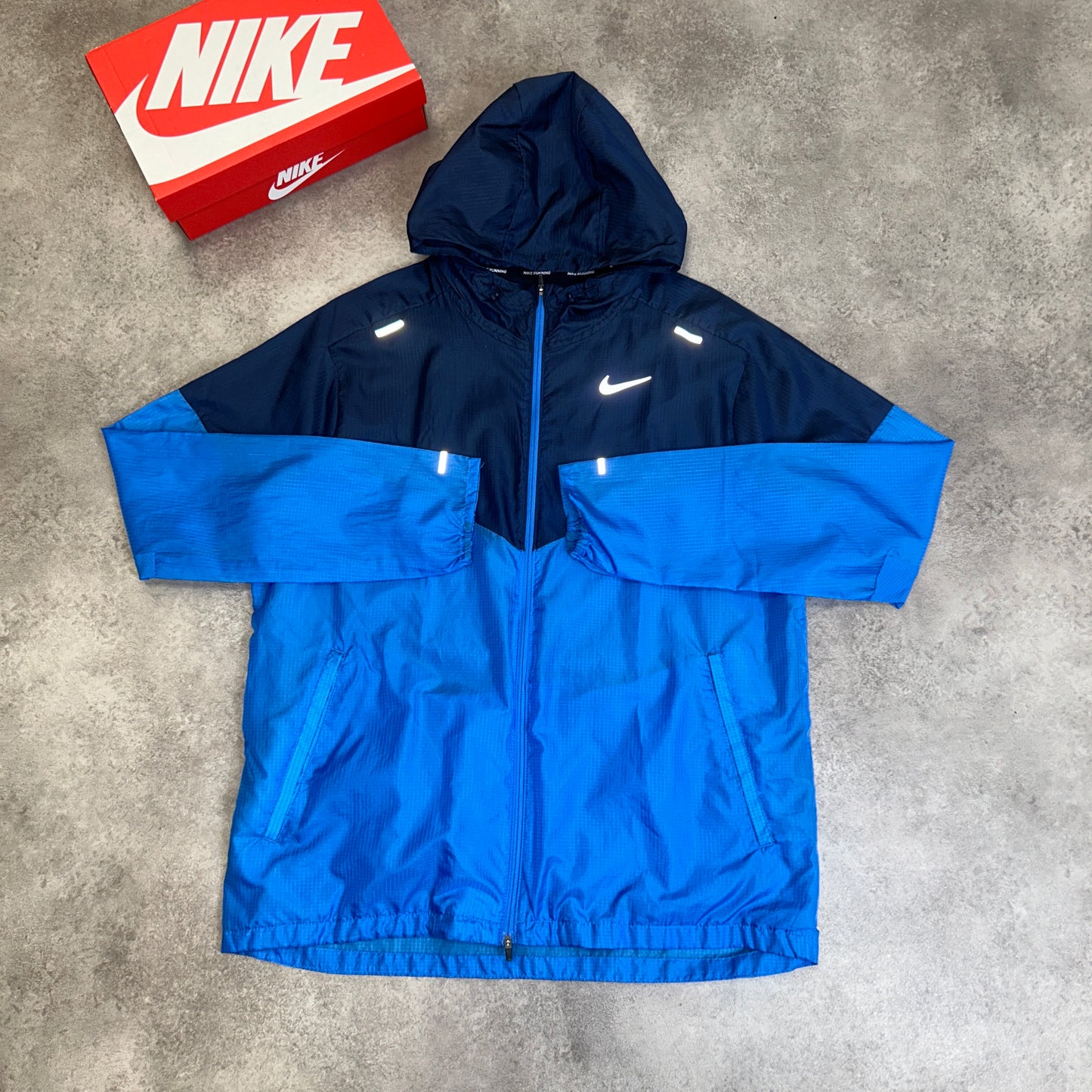 Nike “Navy Blue” UV Windrunner