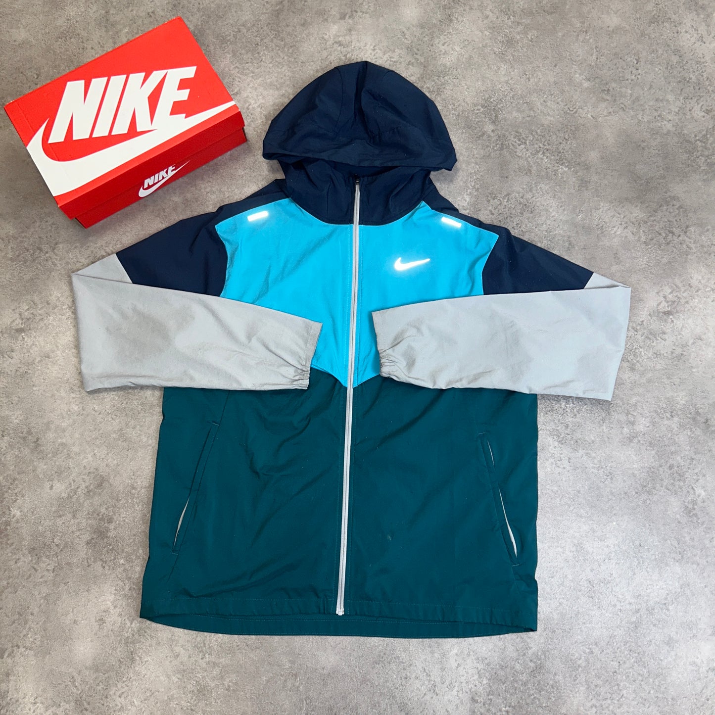 Nike “Aquas/Navy” Windrunner