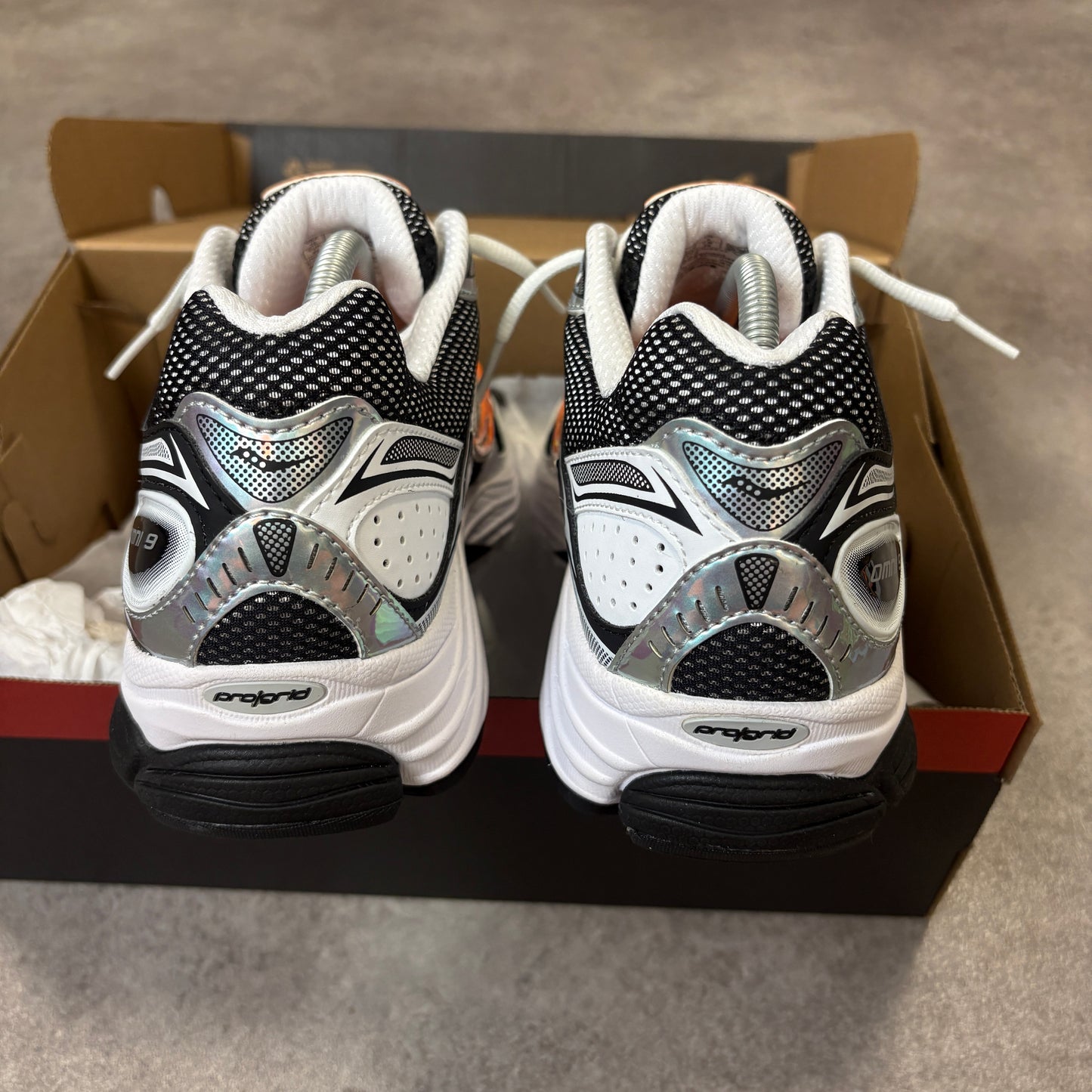 Saucony ProGrid Omni 9 “Black / Orange”