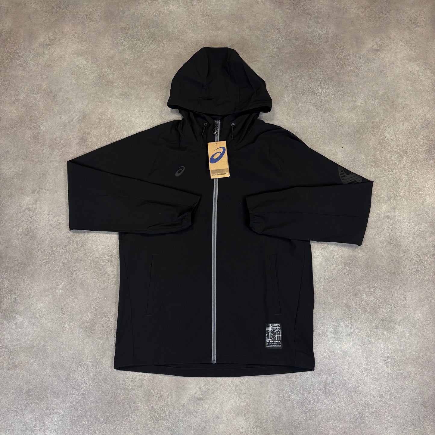 Asics Triple Black “Spiral” Jacket